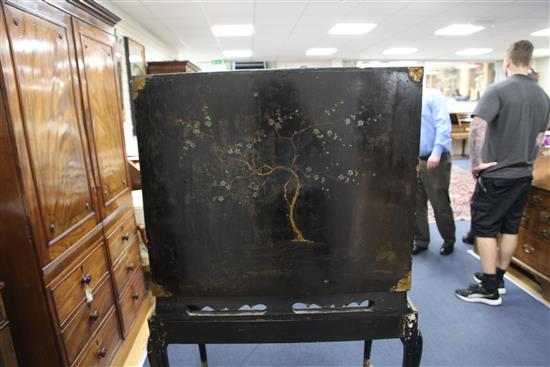 A late 17th century Chinese black lacquer cabinet, overall H. 5ft 3in.